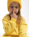 Portrait of funny little girl with funny emotions on her face. Pretty smile kid in studio on white background Royalty Free Stock Photo