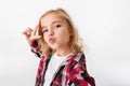 Portrait of a funny little girl grimacing Royalty Free Stock Photo