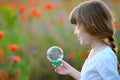 Portrait of funny lovely little girl blowing soap bubbles Royalty Free Stock Photo