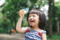 Portrait of funny lovely little girl blowing soap bubbles Royalty Free Stock Photo