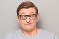 Portrait of funny man fooling around and making goofy silly face Royalty Free Stock Photo