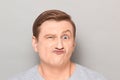 Portrait of funny man grimacing and making goofy crazy face Royalty Free Stock Photo