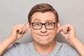 Portrait of funny mature man making silly goofy face and grimacing Royalty Free Stock Photo