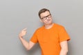 Portrait of funny proud mature man pointing with finger at himself Royalty Free Stock Photo