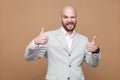 Portrait of funny satisfied handsome middle aged bald bearded bu Royalty Free Stock Photo