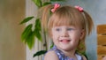 Portrait of funny shy little girl at home Royalty Free Stock Photo