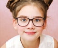 Portrait of funny smiling little girl child wearing glasses isolated Royalty Free Stock Photo