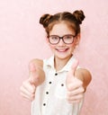 Portrait of funny smiling little girl child wearing glasses isolated Royalty Free Stock Photo