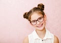 Portrait of funny smiling little girl child wearing glasses isolated Royalty Free Stock Photo