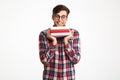 Portrait of a funny smiling male student in eyeglasses Royalty Free Stock Photo