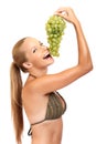 Portrait of a funny woman with grape Royalty Free Stock Photo