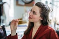 Portrait of funny woman with pencil, having fun at work. Royalty Free Stock Photo