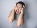 Stressed Young Man Having Pain of Headache Royalty Free Stock Photo