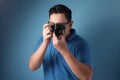 Young Man Shoot with His Camera Royalty Free Stock Photo