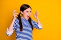 Portrait of furious outraged girl have problem scandal with boyfriend shout yell copyspace wear striped blouse isolated