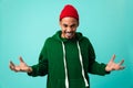 Portrait of a furious young afro american man in hat