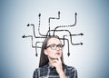 Portrait of a geek girl in glasses and arrow maze Royalty Free Stock Photo