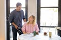 Gentleman helping his girlfriend at restaurant Royalty Free Stock Photo