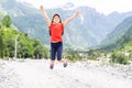 portrait of a girl against the panorama of the Alps Royalty Free Stock Photo