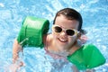 Portrait Of Girl With Armbands In Swimming Pool Royalty Free Stock Photo