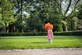 Portrait of a girl with a Belgian flag wig in the park. Royalty Free Stock Photo