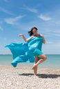 Portrait of girl in blue pareo on beach