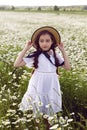 Portrait girl child in a white dress standing Royalty Free Stock Photo