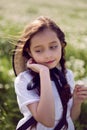 Portrait girl child in a white dress standing Royalty Free Stock Photo