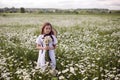 Portrait girl child in a white dress standing Royalty Free Stock Photo