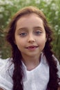 Portrait girl child in a white dress standing Royalty Free Stock Photo