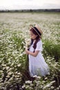 Portrait girl child in a white dress standing Royalty Free Stock Photo