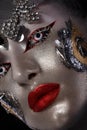 Portrait of a girl with creative art make-up. Unusual image. Royalty Free Stock Photo