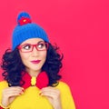 Portrait a girl on a crimson background