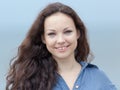 Portrait of girl with curly hair and gap between teeth Royalty Free Stock Photo