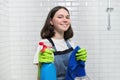 Portrait of girl doing cleaning in bathroom Royalty Free Stock Photo
