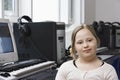 Portrait of girl (10-12) with Down syndrome in home recording studio Royalty Free Stock Photo