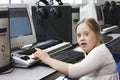 Portrait of girl (10-12) with Down syndrome in home  recording studio Royalty Free Stock Photo