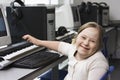 Portrait of girl (10-12) with Down syndrome in home  recording studio Royalty Free Stock Photo