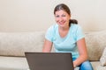 Portrait of a girl of European appearance with a laptop