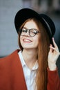 Portrait of a beautiful girl in a hat and coat Royalty Free Stock Photo
