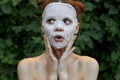 Portrait of a girl face mask Touch your face with your hands clear skin Royalty Free Stock Photo