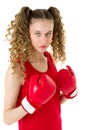 Portrait of girl fighting in red boxing gloves Royalty Free Stock Photo