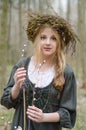 Portrait of a girl in a folk medieval style with willow branch Royalty Free Stock Photo