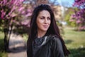 Portrait of a girl in front of cherry blossom Royalty Free Stock Photo