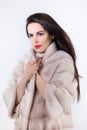 Portrait girl in fur coat with red lipstick Royalty Free Stock Photo