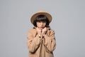 Portrait of young girl get freeze wearing overcoat and hat isolated on white background Royalty Free Stock Photo