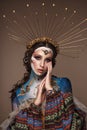 Portrait of a girl with gold and blue creative art make-up. Royalty Free Stock Photo