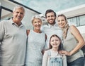 Portrait of girl, grandparents and parents for real estate enjoy new house, luxury apartment and residential. Family Royalty Free Stock Photo