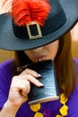 Portrait girl in hat with flask Royalty Free Stock Photo