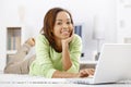 Portrait of girl at home with laptop Royalty Free Stock Photo